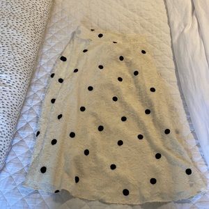 Anthropologie Eri + Ali midi skit. White with black dots
